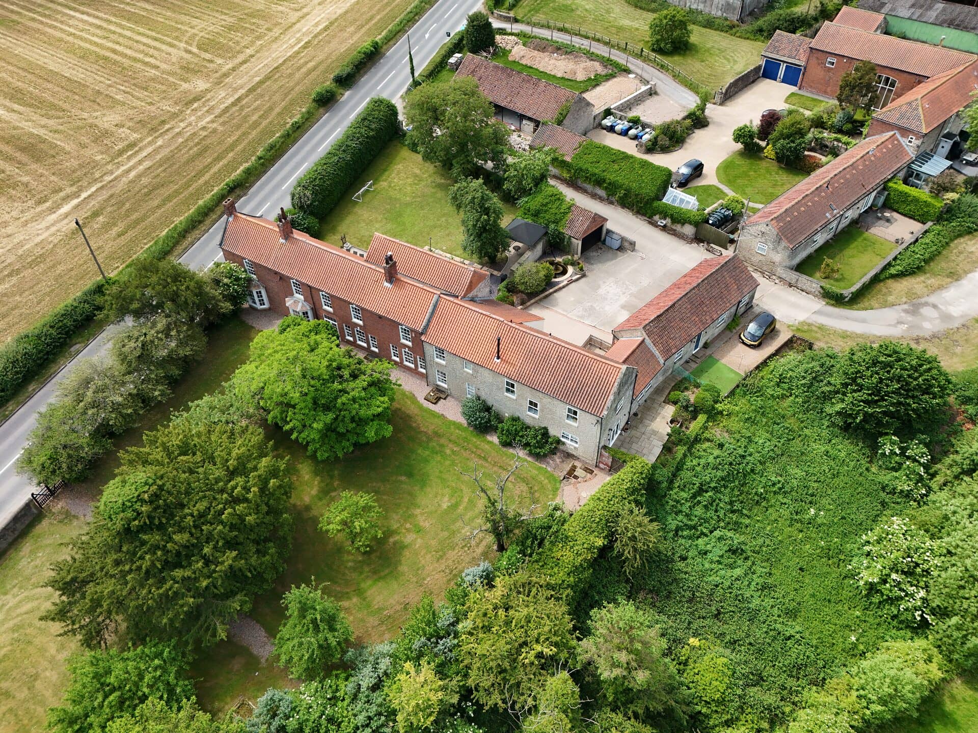Aerial photo of homes and gardens among mature trees in South Yorkshire